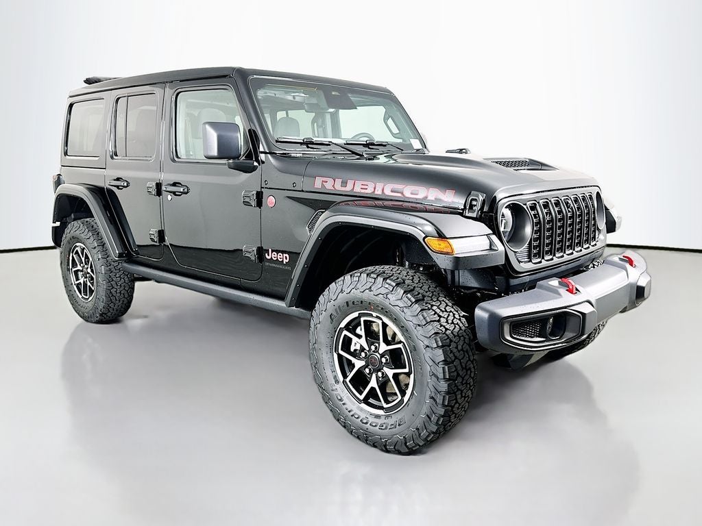 2026 Jeep Wrangler WRANGLER 4-DOOR RUBICON in Black Clear-Coat Exterior Paint — front three-quarter view