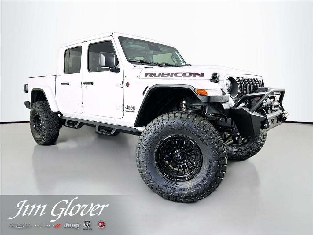 2026 Jeep Gladiator GLADIATOR RUBICON 4X4 in Bright White Clear-Coat Exterior Paint — front three-quarter view