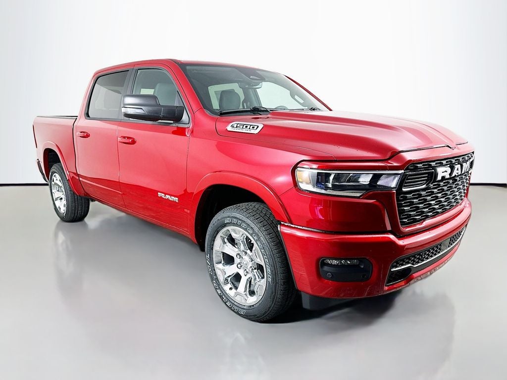 2026 RAM 1500 RAM 1500 BIG HORN CREW CAB 4X2 5'7' BOX in Molten Red Pearl-Coat Exterior Paint — front three-quarter view