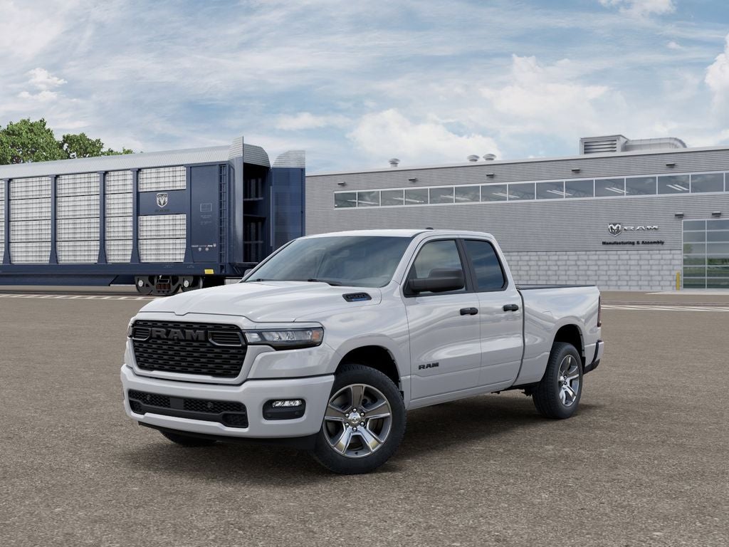 2026 RAM 1500 RAM 1500 EXPRESS QUAD CAB 4X2 6'4' BOX in Bright White Clear-Coat Exterior Paint — front three-quarter view