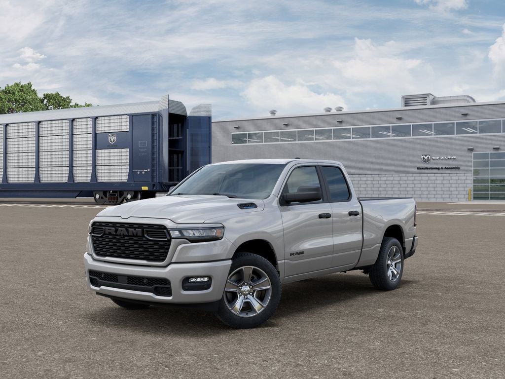 2026 RAM 1500 RAM 1500 EXPRESS QUAD CAB 4X2 6'4' BOX in Silver Zynith Exterior Paint — front three-quarter view
