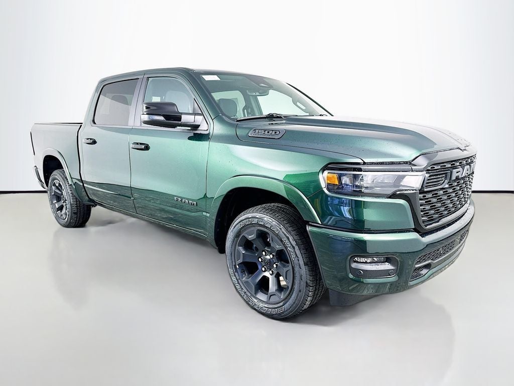 2026 RAM 1500 RAM 1500 BIG HORN CREW CAB 4X4 5'7' BOX in Serrano-Green Metallic Exterior Paint — front three-quarter view
