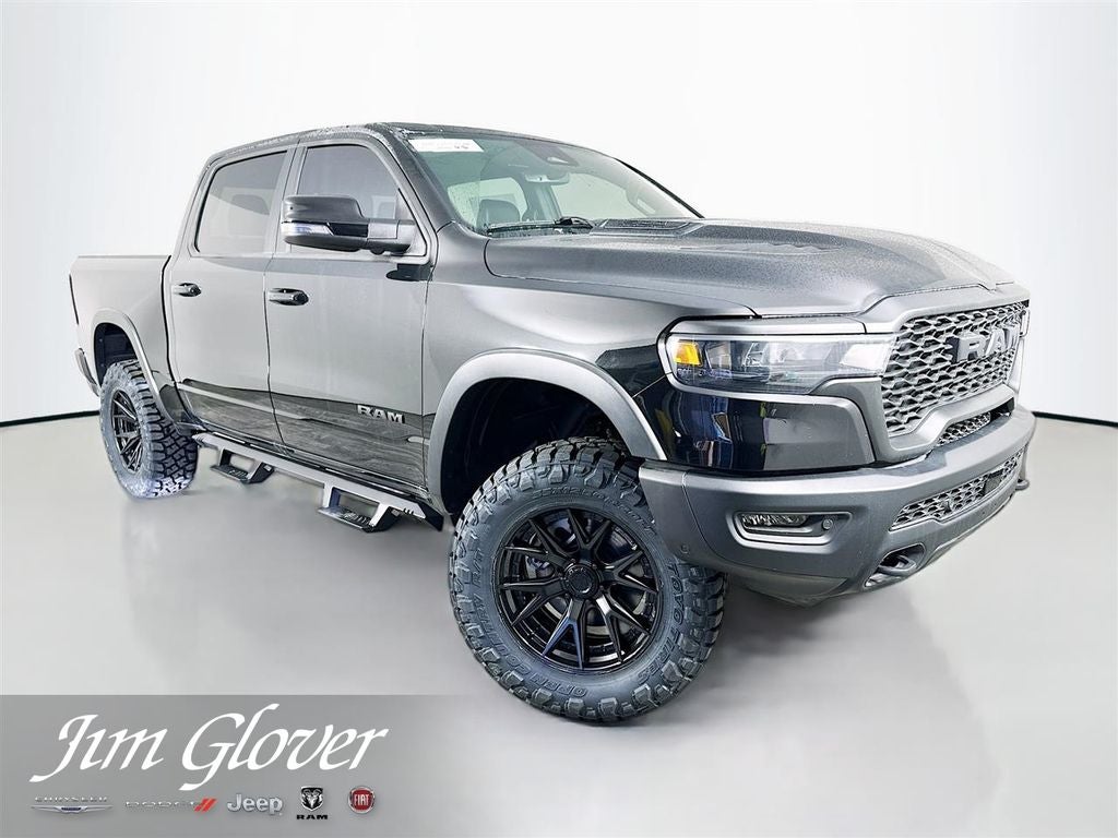 2026 RAM 1500 RAM 1500 REBEL CREW CAB 4X4 5'7' BOX in Diamond Black Crystal Pearl-Coat Exterior Paint — front three-quarter view
