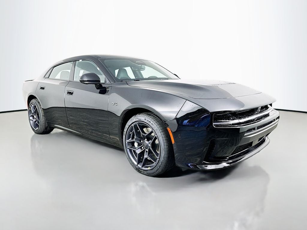 2026 Dodge Charger CHARGER R/T PLUS 4-DOOR AWD in Diamond Black Crystal Pearlcoat — front three-quarter view