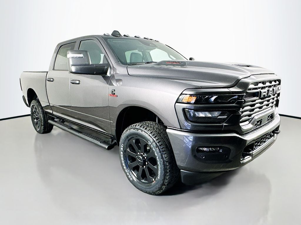 2026 RAM 2500 RAM 2500 BLACK EXPRESS CREW CAB 4X4 6'4' BOX in Granite Crystal Metallic Clear-Coat Exterior Paint — front three-quarter view