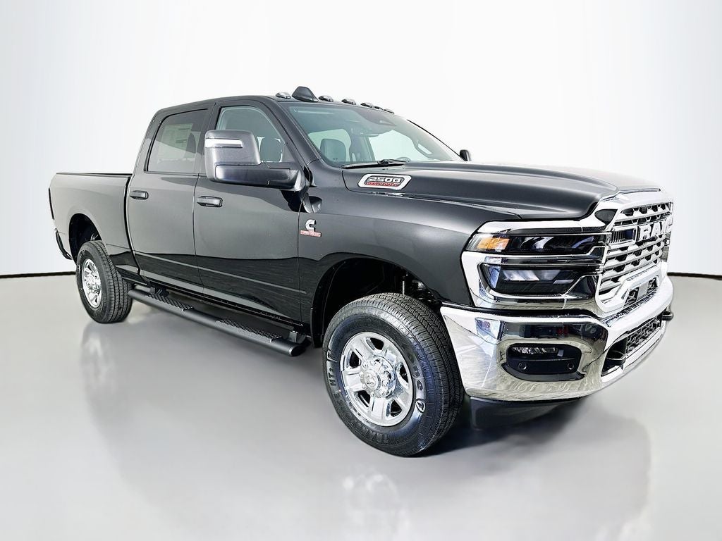 2026 RAM 2500 RAM 2500 TRADESMAN CREW CAB 4X4 6'4' BOX in Diamond Black Crystal Pearl-Coat Exterior Paint — front three-quarter view