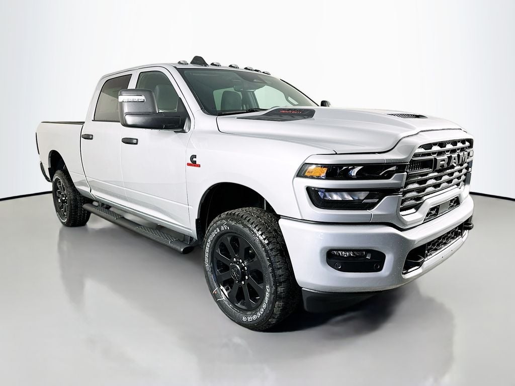 2026 RAM 2500 RAM 2500 BLACK EXPRESS CREW CAB 4X4 6'4' BOX in Silver-Zynith Exterior Paint — front three-quarter view