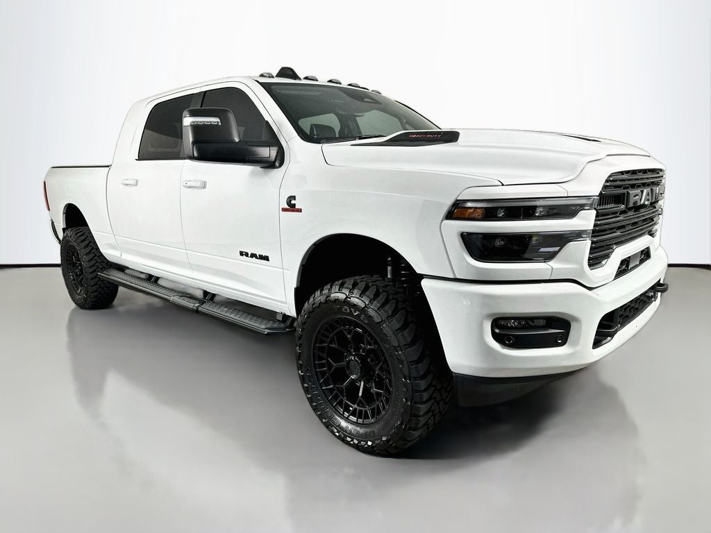 2026 RAM 2500 RAM 2500 LARAMIE MEGA CAB 4X4 6'4' BOX in Bright White Clear-Coat Exterior Paint — front three-quarter view