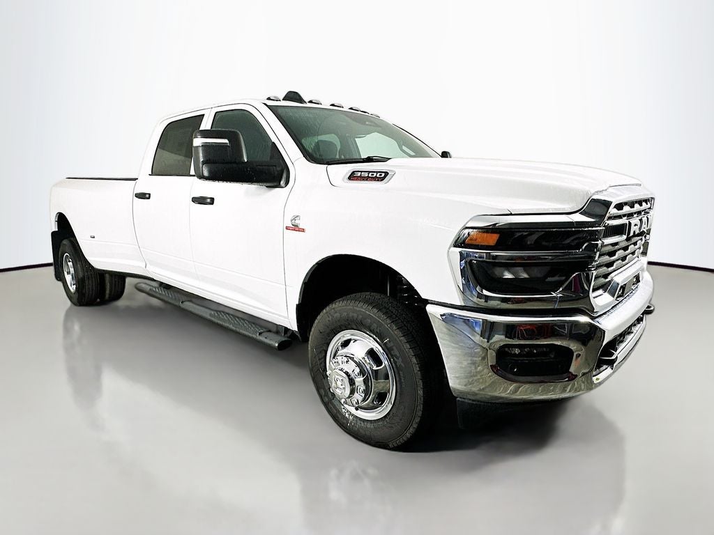 2026 RAM 3500 RAM 3500 TRADESMAN CREW CAB 4X4 8' BOX in Bright White Clear-Coat Exterior Paint — front three-quarter view