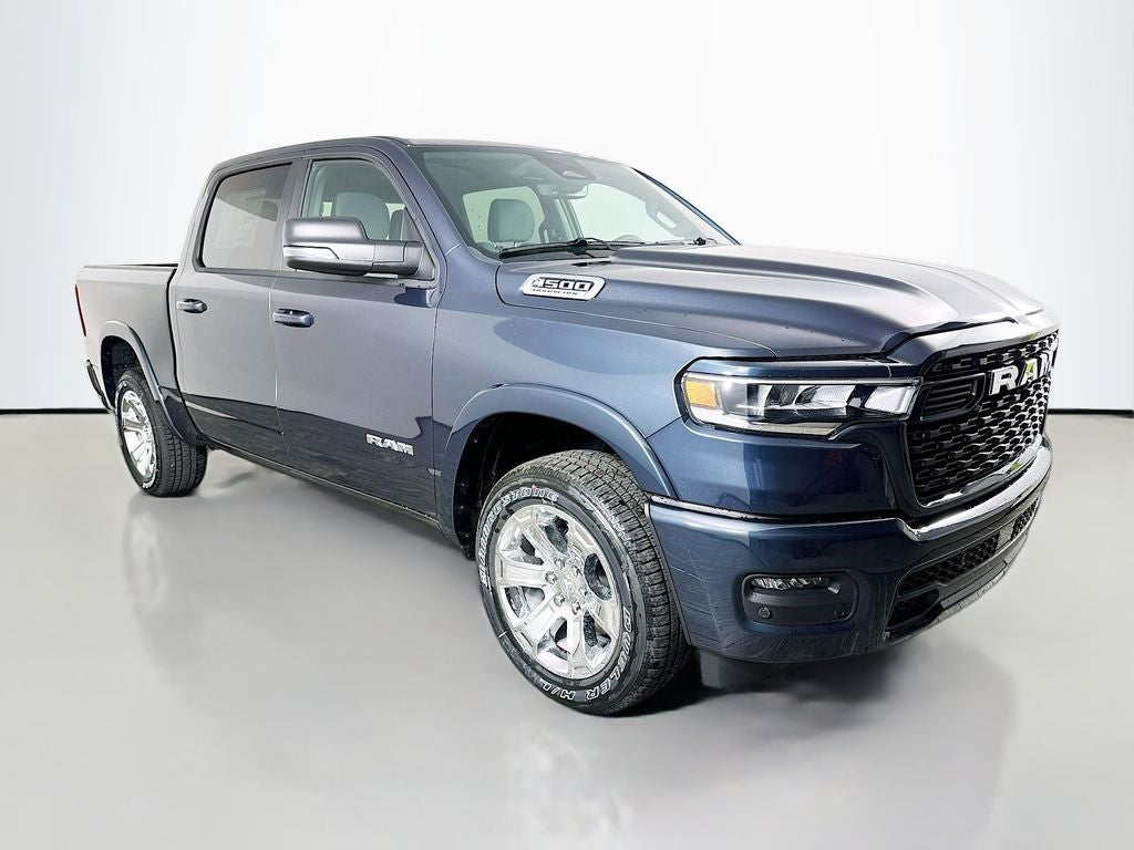 2026 RAM 1500 RAM 1500 BIG HORN CREW CAB 4X4 5'7' BOX in Forged Blue Metallic Exterior Paint — front three-quarter view
